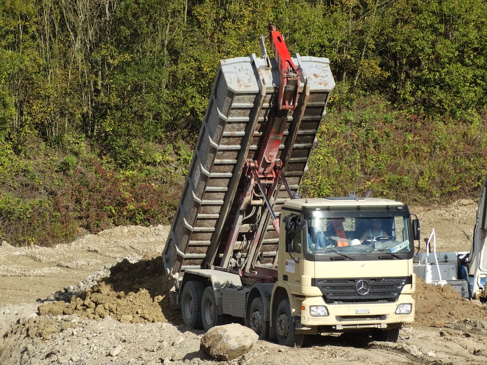 A truck unload sand
