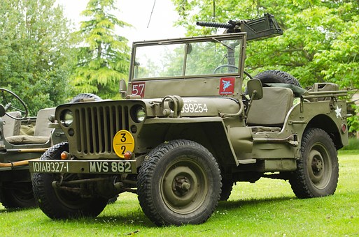 a green jeep in the park